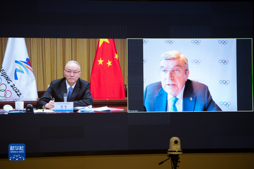Cai Qi Gelar Pertemuan Virtual dengan Presiden IOC
